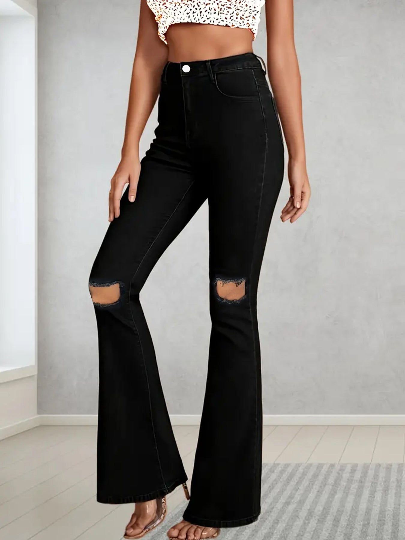 Calça de ganga de mulher plus size, estilo americano, com rasgos.