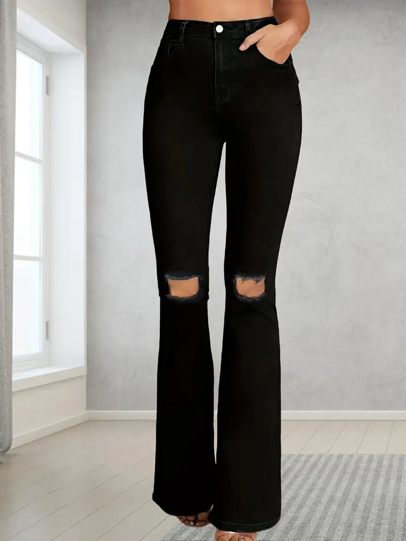 Calça de ganga de mulher plus size, estilo americano, com rasgos.