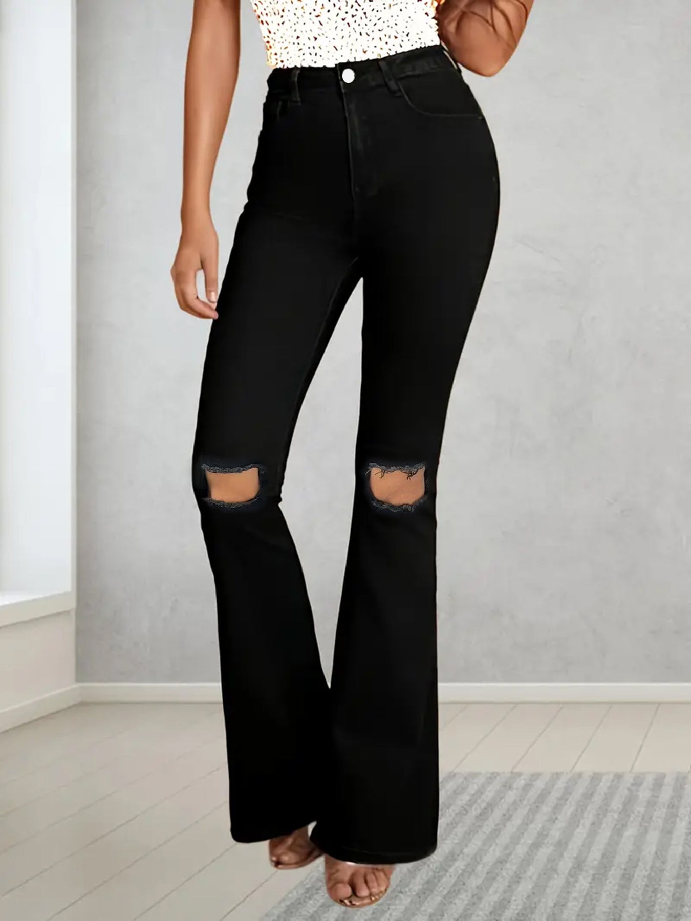 Calça de ganga de mulher plus size, estilo americano, com rasgos.