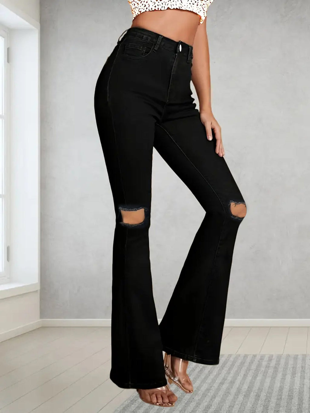 Calça de ganga de mulher plus size, estilo americano, com rasgos.