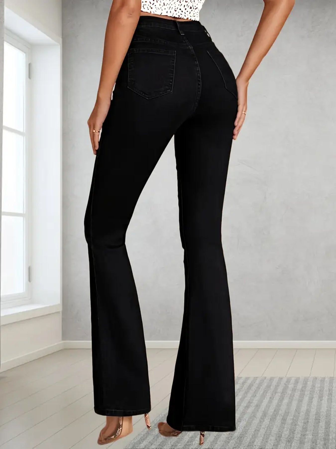 Calça de ganga de mulher plus size, estilo americano, com rasgos.